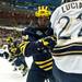 Michigan junior defenseman Jon Merrill checks Notre Dame left wingman Mario Lucia on Sunday, March 24. Daniel Brenner I AnnArbor.com